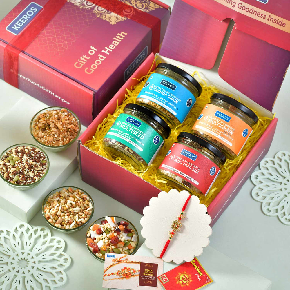 Keeros Healthy Rakhi Gift Hamper for Brother with Rakhi Roli Chandan Tikka Chawal Mishri Pack | Combo of Sweet & Salted, Tasty & Nutritious Super Snacks in Glass Jars Packed in a Beautiful Gift Hamper