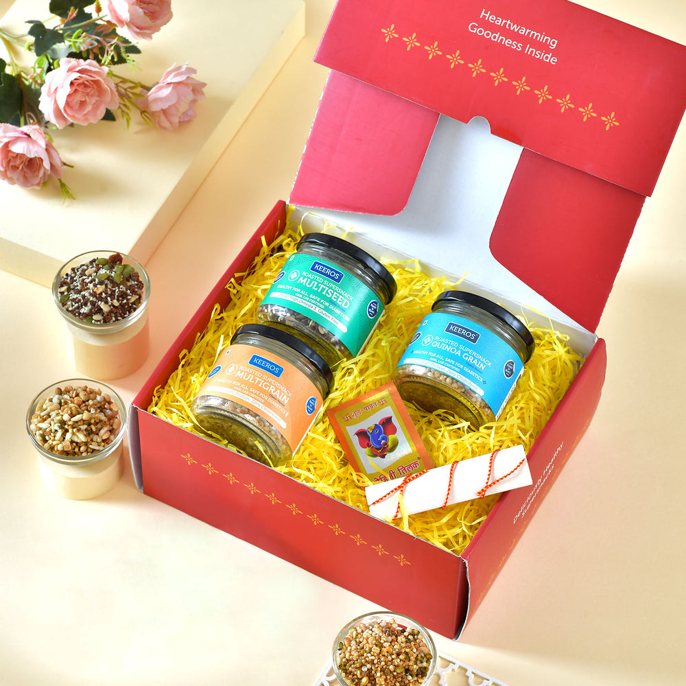 Keeros Healthy Bhai Dooj Gift for Brother with Roli Moli Chandan Tikka Chawal Mishri Pack & 2 Beautiful Diyas | Combo of Sweet & Salted, Tasty & Nutritious Super Snacks in Elegant Glass Jars Packed in Premium Gift Hamper