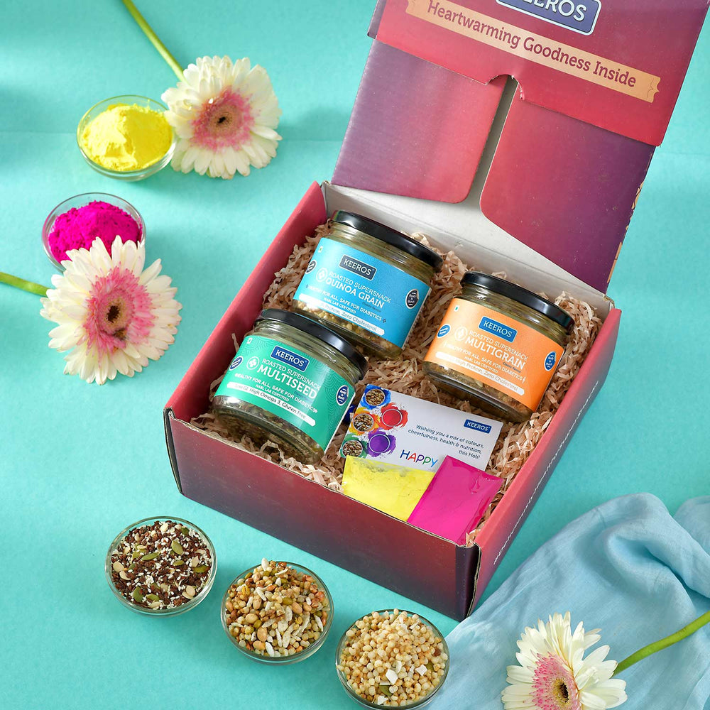 Keeros Healthy Holi Gift Box with Card : Combo of Sweet & Salted, Tasty & Nutritious Super Snacks in Elegant Glass Jars Packed in Premium Gift Hamper | Holi Gift for Family and Friends