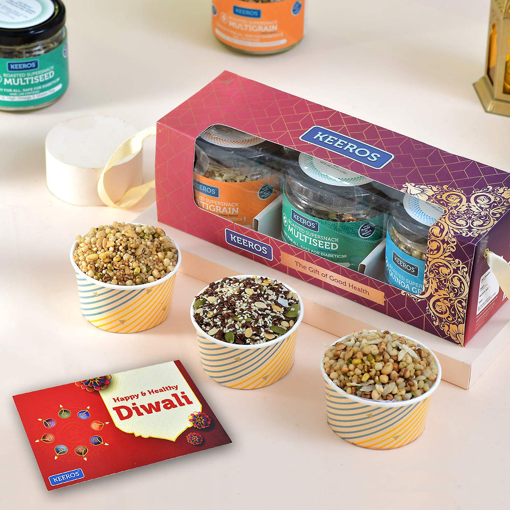 Keeros Healthy Diwali Gift Hamper with Wishes Card | Variety of Sweet & Salted, Tasty & Nutritious Roasted Super Snacks in Beautiful Glass Jars Packed in a Premium Gift Hamper